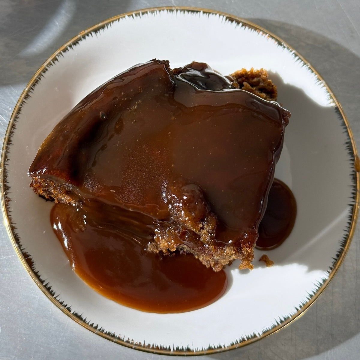Sticky toffee pudding cake slice